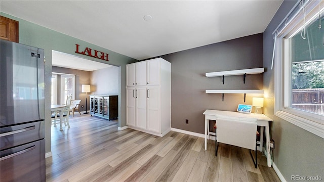 982 E 130th Cir, Thornton, CO 80241 - office space featuring light wood-type flooring and baseboards