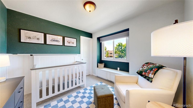 982 E 130th Cir, Thornton, CO 80241 - bedroom featuring light colored carpet and wainscoting