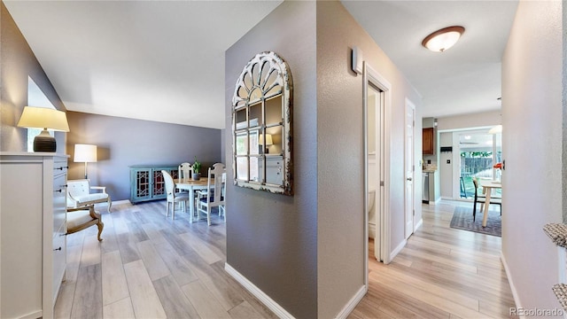 982 E 130th Cir, Thornton, CO 80241 - hallway with light wood-style floors and baseboards