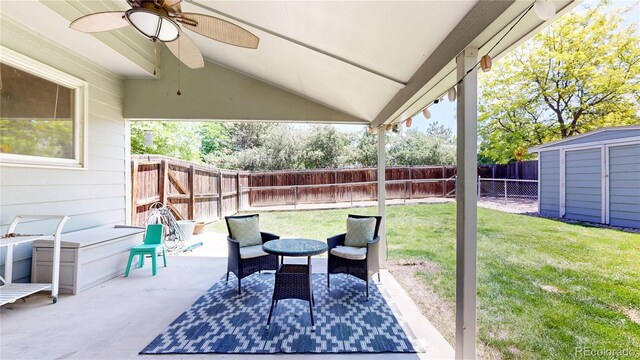 982 E 130th Cir, Thornton, CO 80241 - fenced backyard featuring a patio area, a ceiling fan, and a shed