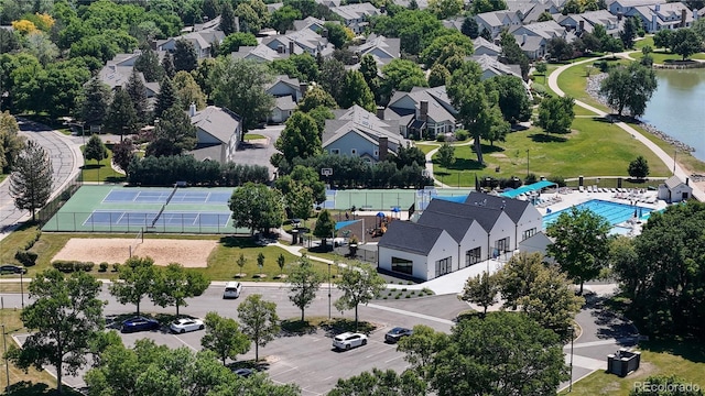 982 E 130th Cir, Thornton, CO 80241 - aerial view of residential area featuring a pool area and a large body of water