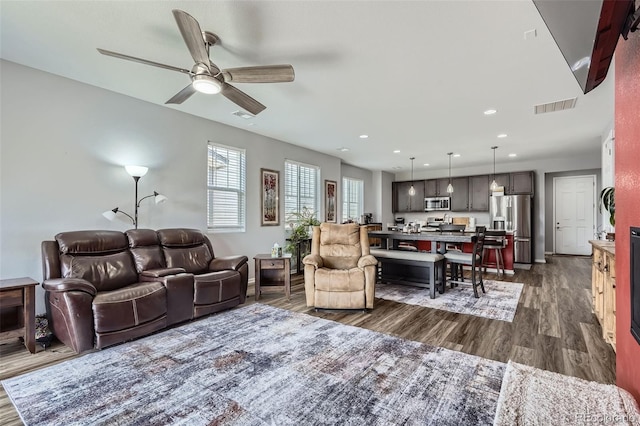 9679 Waco St, Commerce City, CO 80022 - living room with dark wood-type flooring, ceiling fan, and recessed lighting