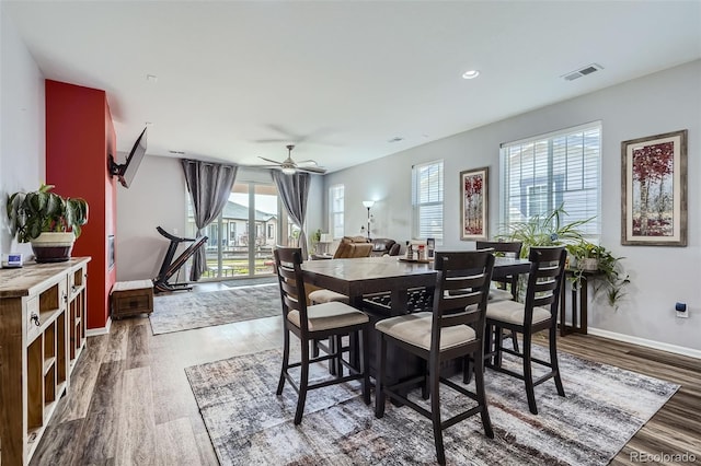 9679 Waco St, Commerce City, CO 80022 - dining area featuring healthy amount of natural light, dark wood-style floors, a ceiling fan, and recessed lighting
