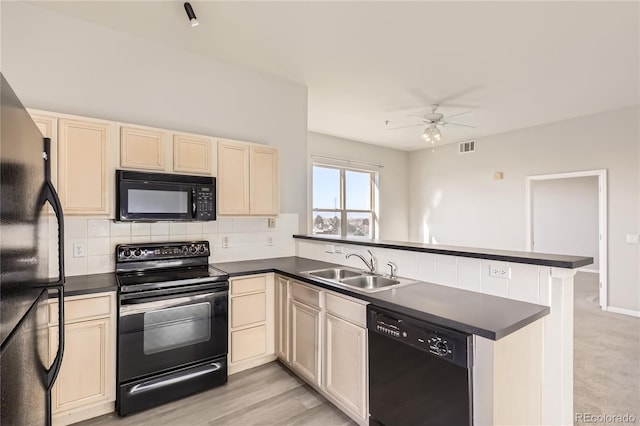 kitchen with black appliances, sink, decorative backsplash, ceiling fan, and kitchen peninsula