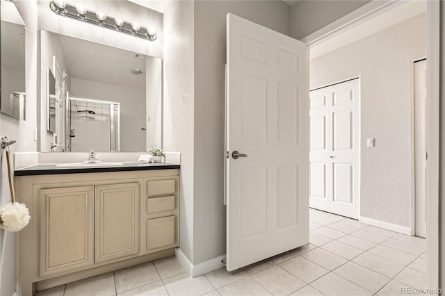 bathroom featuring vanity and tile patterned floors