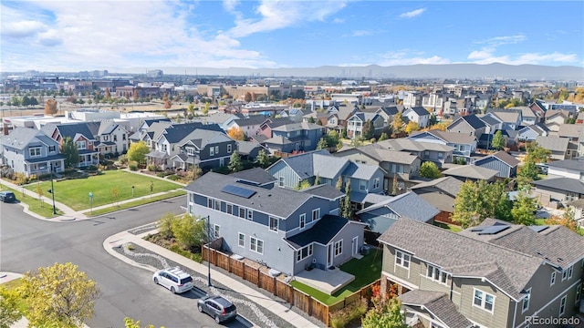 birds eye view of property featuring a mountain view