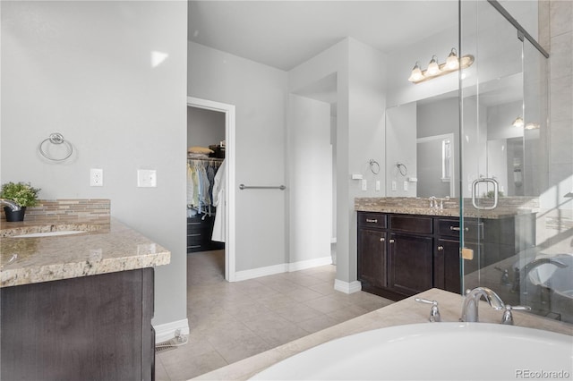 bathroom with vanity, separate shower and tub, and tile patterned flooring