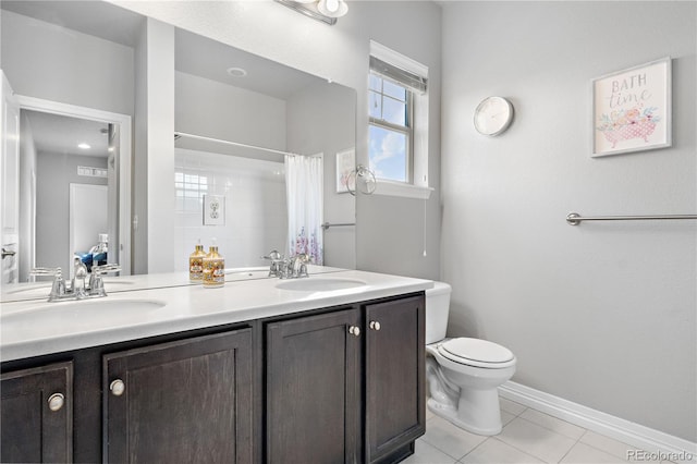 bathroom featuring vanity, curtained shower, toilet, and tile patterned flooring