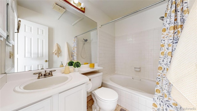 full bathroom with vanity, toilet, and shower / tub combo