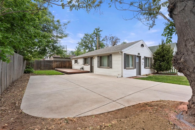 3925 Pecos St, Denver, CO 80211 - back of property with a fenced backyard, a patio area, and a wooden deck