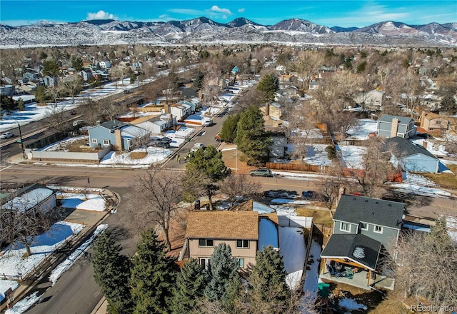 drone / aerial view with a residential view and a mountain view