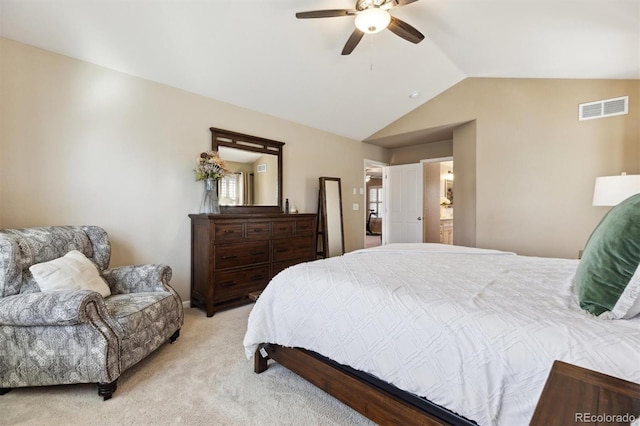 bedroom featuring visible vents, vaulted ceiling, light carpet, and ceiling fan