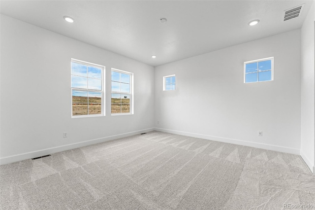 16975 W 92nd Loop, Arvada, CO 80007 - empty room featuring light colored carpet, baseboards, and recessed lighting