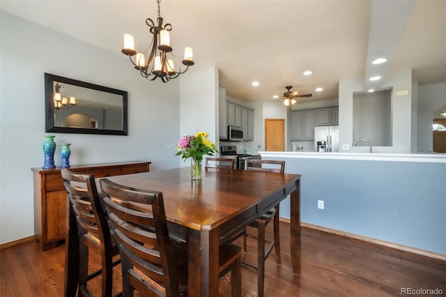 4197 Purple Plum Way, Colorado Springs, CO 80920 - dining space featuring dark wood finished floors, recessed lighting, a ceiling fan, a chandelier, and baseboards