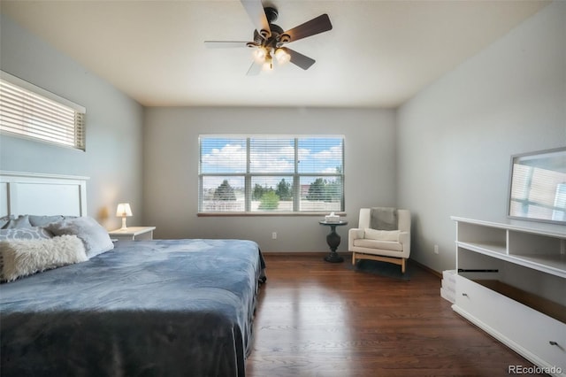 4197 Purple Plum Way, Colorado Springs, CO 80920 - bedroom featuring dark wood-style floors and a ceiling fan