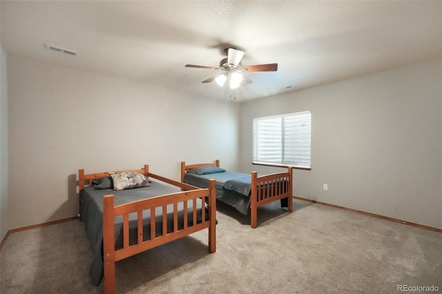 4197 Purple Plum Way, Colorado Springs, CO 80920 - carpeted bedroom with baseboards and a ceiling fan