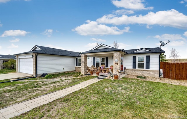 652 Dakota St, Kiowa, CO 80117 - single story home with a porch, a garage, driveway, and brick siding