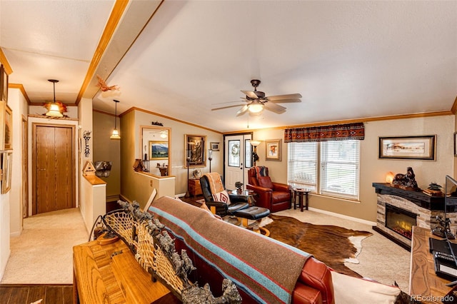 652 Dakota St, Kiowa, CO 80117 - living room featuring ornamental molding, baseboards, carpet, ceiling fan, and a fireplace