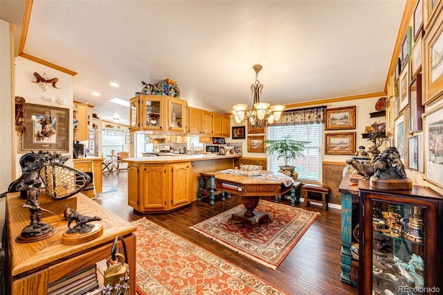 652 Dakota St, Kiowa, CO 80117 - kitchen with a peninsula, a chandelier, glass insert cabinets, light countertops, and dark wood-type flooring