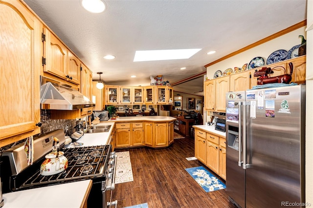 652 Dakota St, Kiowa, CO 80117 - kitchen with high end refrigerator, gas range, under cabinet range hood, ornamental molding, and a peninsula