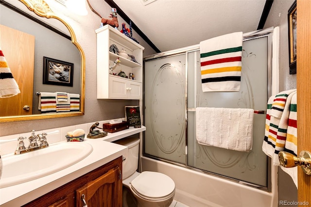 652 Dakota St, Kiowa, CO 80117 - bathroom with vanity, bath / shower combo with glass door, toilet, and vaulted ceiling