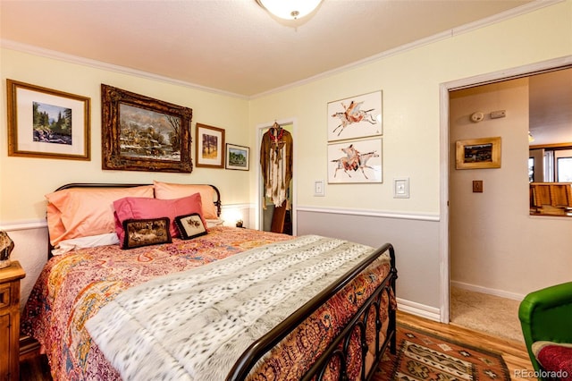 652 Dakota St, Kiowa, CO 80117 - bedroom with ornamental molding, dark wood-type flooring, and baseboards