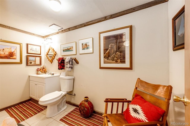 652 Dakota St, Kiowa, CO 80117 - bathroom with toilet, tile patterned flooring, vanity, and baseboards