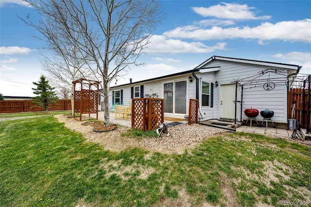 652 Dakota St, Kiowa, CO 80117 - rear view of house featuring a patio