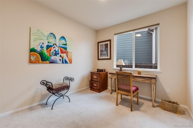 carpeted office with baseboards