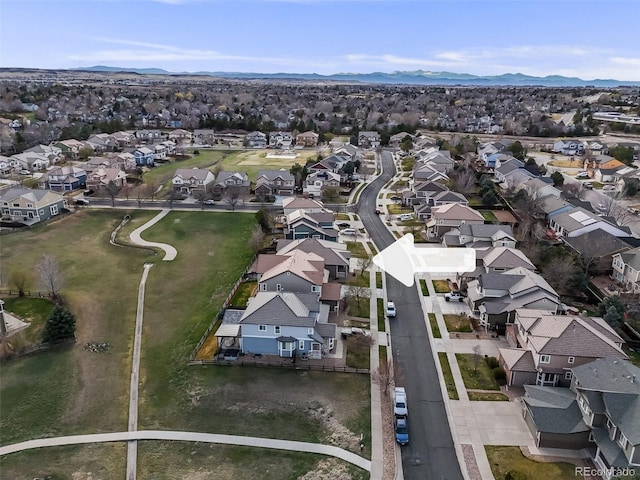 aerial view with a residential view and a mountain view