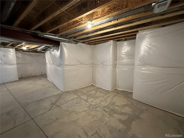 basement featuring heating unit