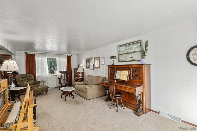 7622 E Nassau Ave, Denver, CO 80237 - carpeted living room with baseboards