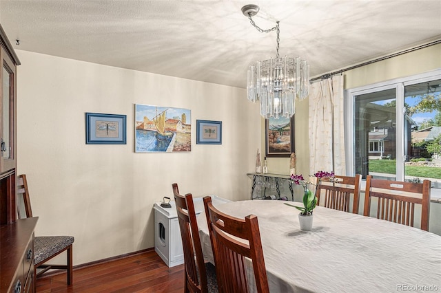 7622 E Nassau Ave, Denver, CO 80237 - dining area with dark wood-style floors and a chandelier