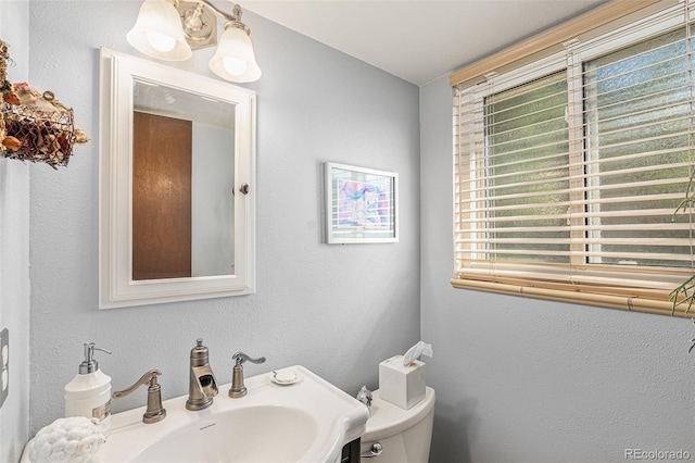 7622 E Nassau Ave, Denver, CO 80237 - half bathroom with healthy amount of natural light