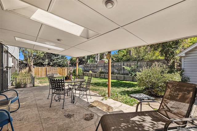 7622 E Nassau Ave, Denver, CO 80237 - fenced backyard featuring outdoor dining area and a patio