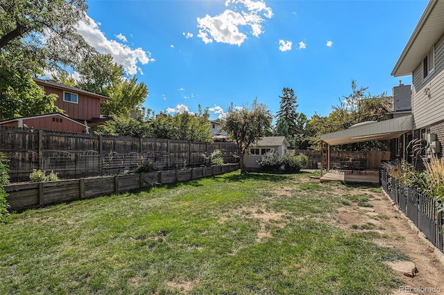 7622 E Nassau Ave, Denver, CO 80237 - fenced backyard featuring a gazebo and an outbuilding
