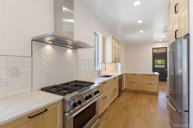 459 N Clarkson St, Denver, CO 80218 - kitchen with island range hood, high quality appliances, light brown cabinetry, light wood-type flooring, and recessed lighting