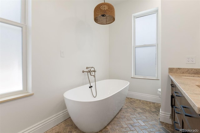 459 N Clarkson St, Denver, CO 80218 - full bathroom with a freestanding tub and vanity
