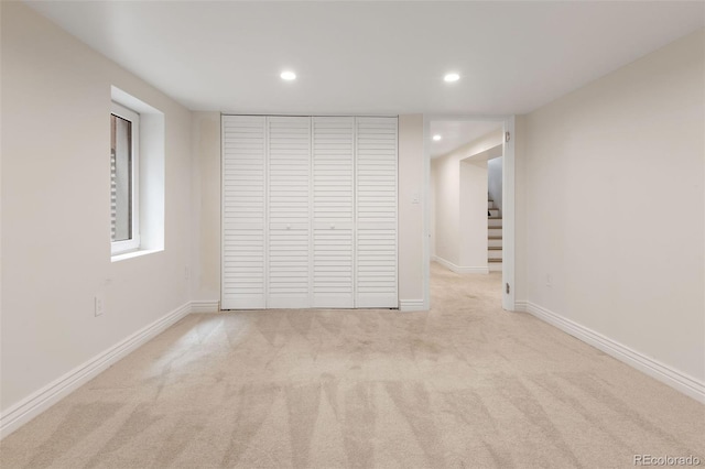 459 N Clarkson St, Denver, CO 80218 - unfurnished bedroom featuring carpet flooring, recessed lighting, and a closet