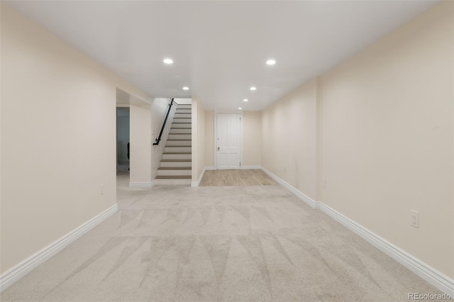 459 N Clarkson St, Denver, CO 80218 - finished below grade area with recessed lighting, carpet, and stairway