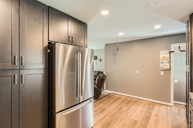 3180 Mowry Pl, Westminster, CO 80031 - kitchen with recessed lighting, freestanding refrigerator, light wood-type flooring, and baseboards