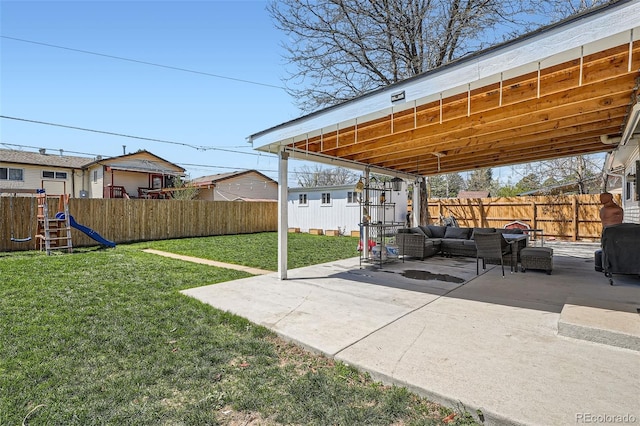 3180 Mowry Pl, Westminster, CO 80031 - view of patio featuring an outdoor hangout area, a fenced backyard, and a playground