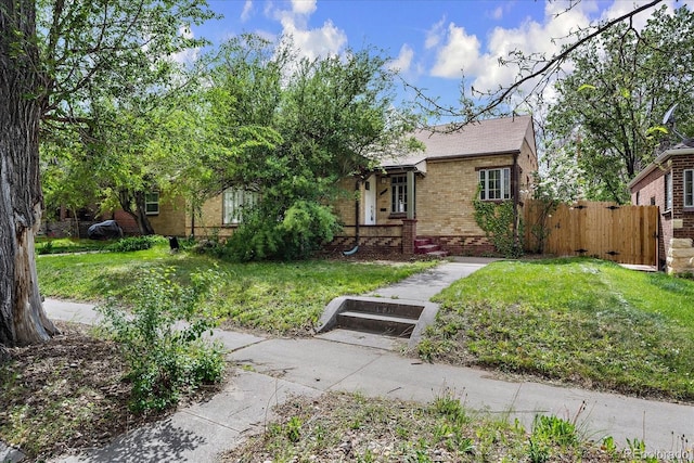 1439 Dexter St, Denver, CO 80220 - view of front of house with brick siding