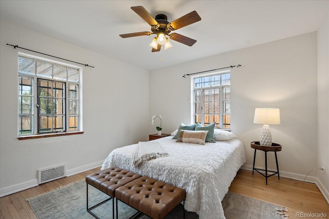 1439 Dexter St, Denver, CO 80220 - bedroom with baseboards, light wood-style flooring, and ceiling fan