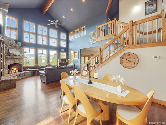 77 B Rd, Silverthorne, CO 80498 - dining room with ceiling fan, beamed ceiling, high vaulted ceiling, wood finished floors, and stairs