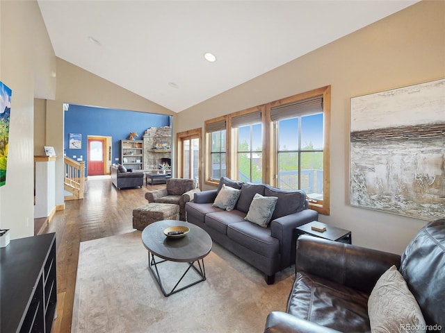 77 B Rd, Silverthorne, CO 80498 - living room featuring wood finished floors, stairs, high vaulted ceiling, and recessed lighting