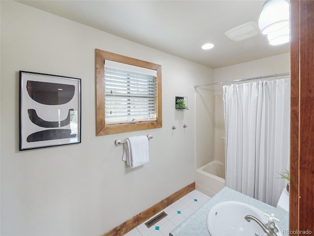 77 B Rd, Silverthorne, CO 80498 - bathroom with a sink, tile patterned floors, baseboards, and shower / bathtub combination with curtain