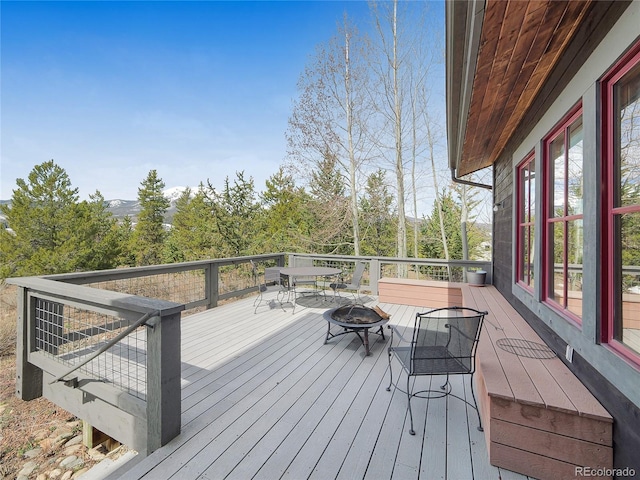 77 B Rd, Silverthorne, CO 80498 - wooden terrace with an outdoor fire pit