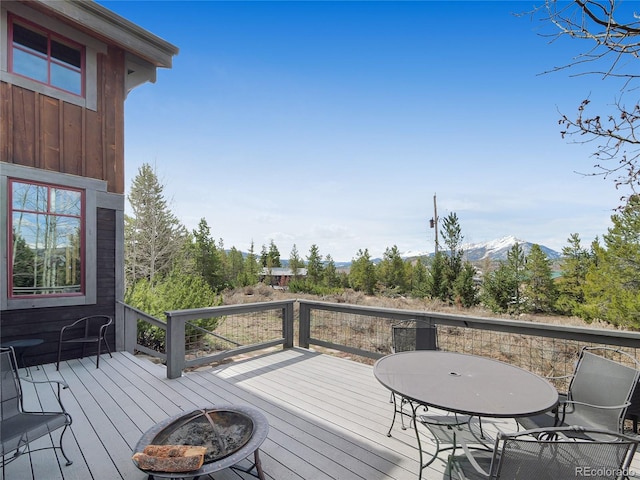 77 B Rd, Silverthorne, CO 80498 - deck featuring a fire pit and a mountain view