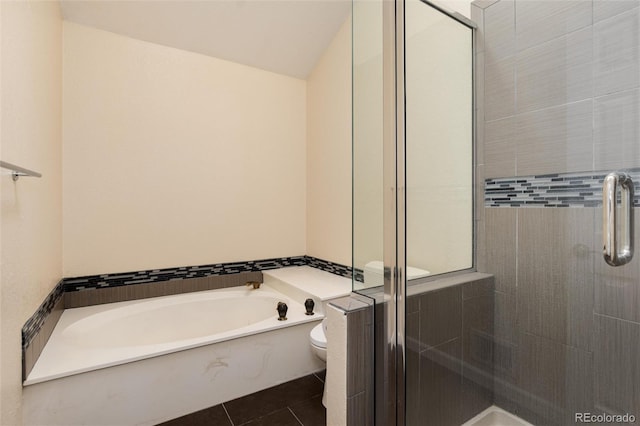 8182 Sweet Water Rd, Lone Tree, CO 80124 - bathroom featuring toilet, a garden tub, a shower stall, and tile patterned flooring